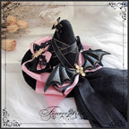 The Eternal Rose handmade accessory set combines playful bunny ears with a charming mini top hat hair clip, crafted for a whimsical Lolita look. Designed with gothic elegance and festive Halloween flair, it balances sweetness with dramatic fantasy. Perfect for cosplay, themed parties, or photo shoots, this set offers versatile styling that enhances Lolita fashion with originality and charm.
