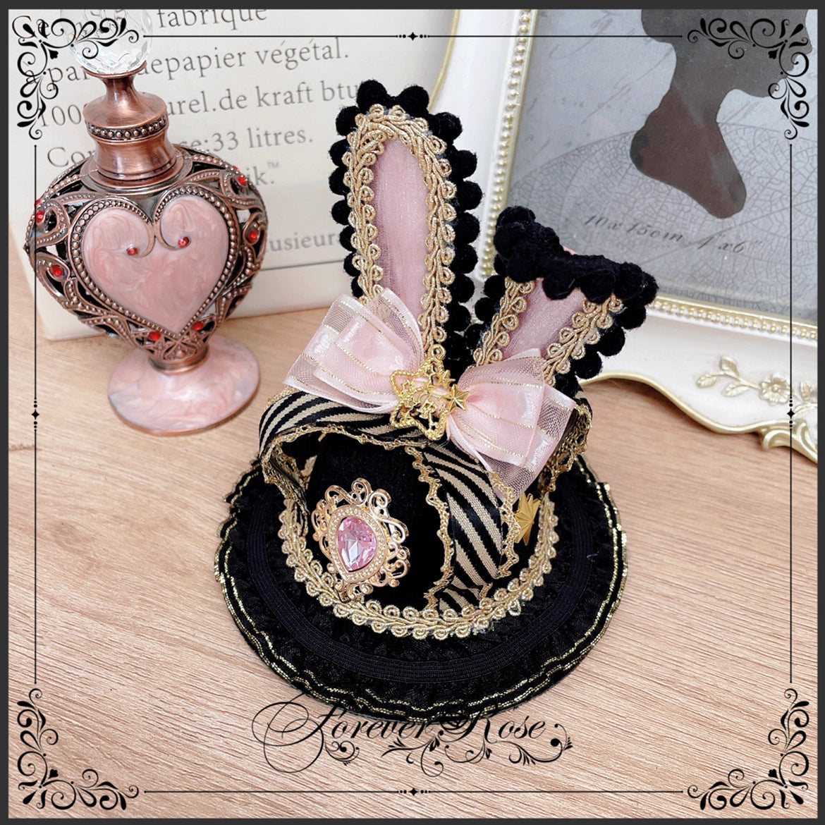 The Eternal Rose handmade accessory set combines playful bunny ears with a charming mini top hat hair clip, crafted for a whimsical Lolita look. Designed with gothic elegance and festive Halloween flair, it balances sweetness with dramatic fantasy. Perfect for cosplay, themed parties, or photo shoots, this set offers versatile styling that enhances Lolita fashion with originality and charm.