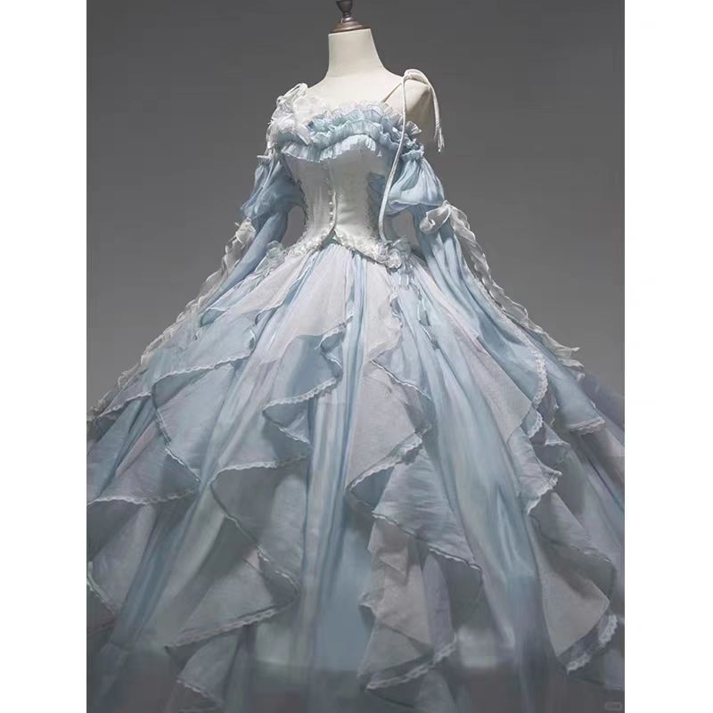 The Blue Evening Princess Dress is designed to capture ethereal beauty and timeless elegance. Crafted in a flowing silhouette with delicate details, it radiates a dreamy, fairytale-like charm. The soft blue tone highlights sophistication while adding a touch of romance, making it perfect for formal events, banquets, or special occasions. This gown blends grace and modern femininity, allowing the wearer to embody both confidence and princess-like allure.