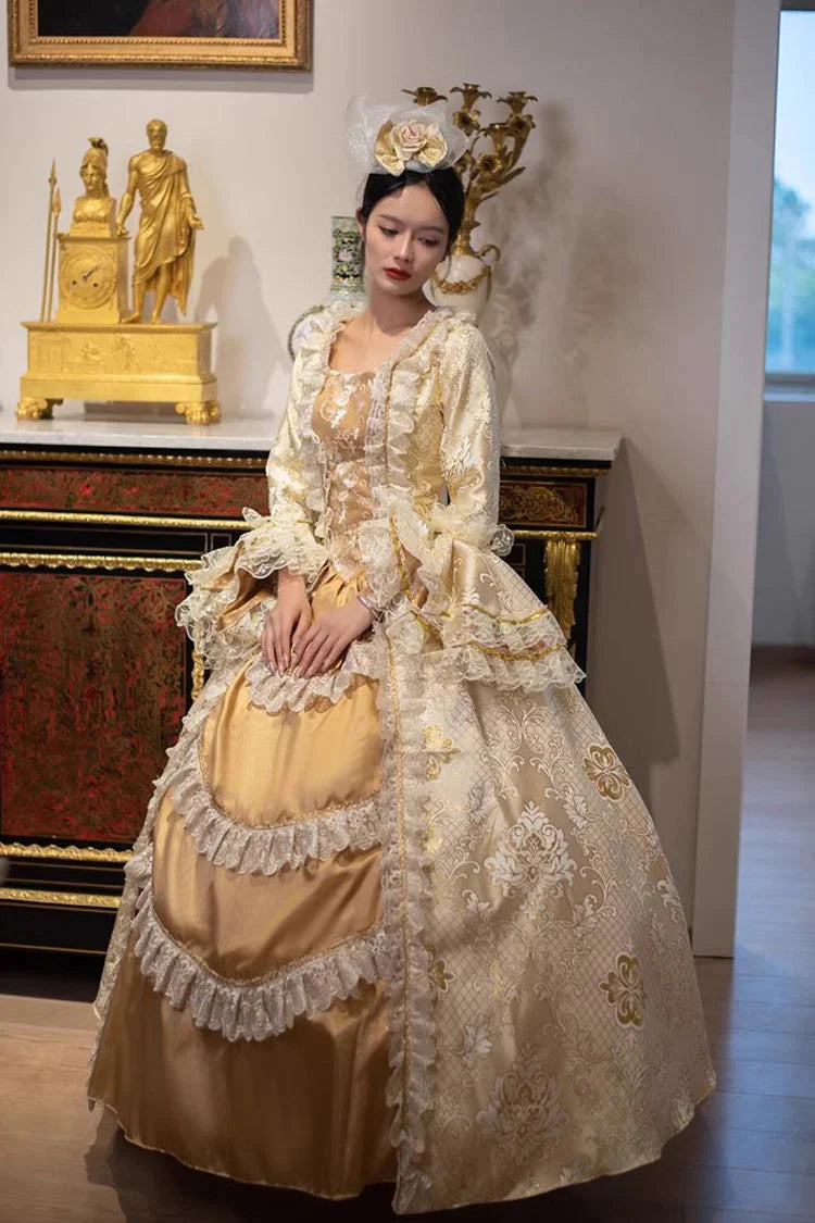 This dress is a tribute to the opulence of history, weaving together the grandeur of medieval courts and the refinement of Victorian elegance. Meticulous gold embroidery evokes royal craftsmanship, while the structured silhouette and lavish details—from lace trims to cascading skirts—celebrate timeless luxury. Designed for modern dreamers, it bridges centuries of artistry, allowing the wearer to embody a narrative where fantasy and heritage dance in harmonious splendor.