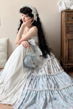 Indulge in sweet charm with this adorable lolita dress set! The off-shoulder neckline and sleeveless design showcase delicate lace and ruffled details, while a playful strawberry print adds a delightful touch. A elegant bowknot accents the bust, enhancing the princess-style silhouette. Perfect for tea parties, cosplay events, or creating a dreamy daily look, this set brings a whimsical and romantic vibe to your wardrobe.