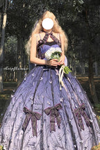 Inspired by the elegance of a princess bride, this exquisite Hime Lolita dress embodies regal fantasy and sophistication. The rich purple hue symbolizes nobility, while intricate Hanayome embroidery and delicate lace express bridal purity and grace. Cascading ruffles and a refined bow detail create a luxurious silhouette fit for royalty. Designed for the discerning Lolita who seeks opulence and storytelling fashion, this piece transforms wearers into the heroine of their own fairytale. Perfect for ceremonie