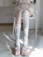Inspired by the delicate aesthetic of Japanese Lolita fashion, these crew socks blend innocence with elegant charm. Soft lace trims and a delicate bow ribbon tie detail create a playful yet refined statement, perfect for adding a touch of kawaii sweetness to any outfit. Designed for comfort and style, they capture the dreamy, romantic essence of Harajuku street culture.