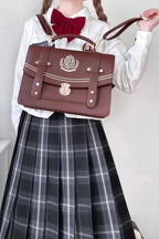 Inspired by the nostalgic elegance of vintage libraries and the whimsical charm of old-school academia, this backpack blends scholarly sophistication with Lolita sweetness. The rich black and brown tones evoke leather-bound books and aged parchment, while playful details like lace and bows add a touch of fantasy to classic design.