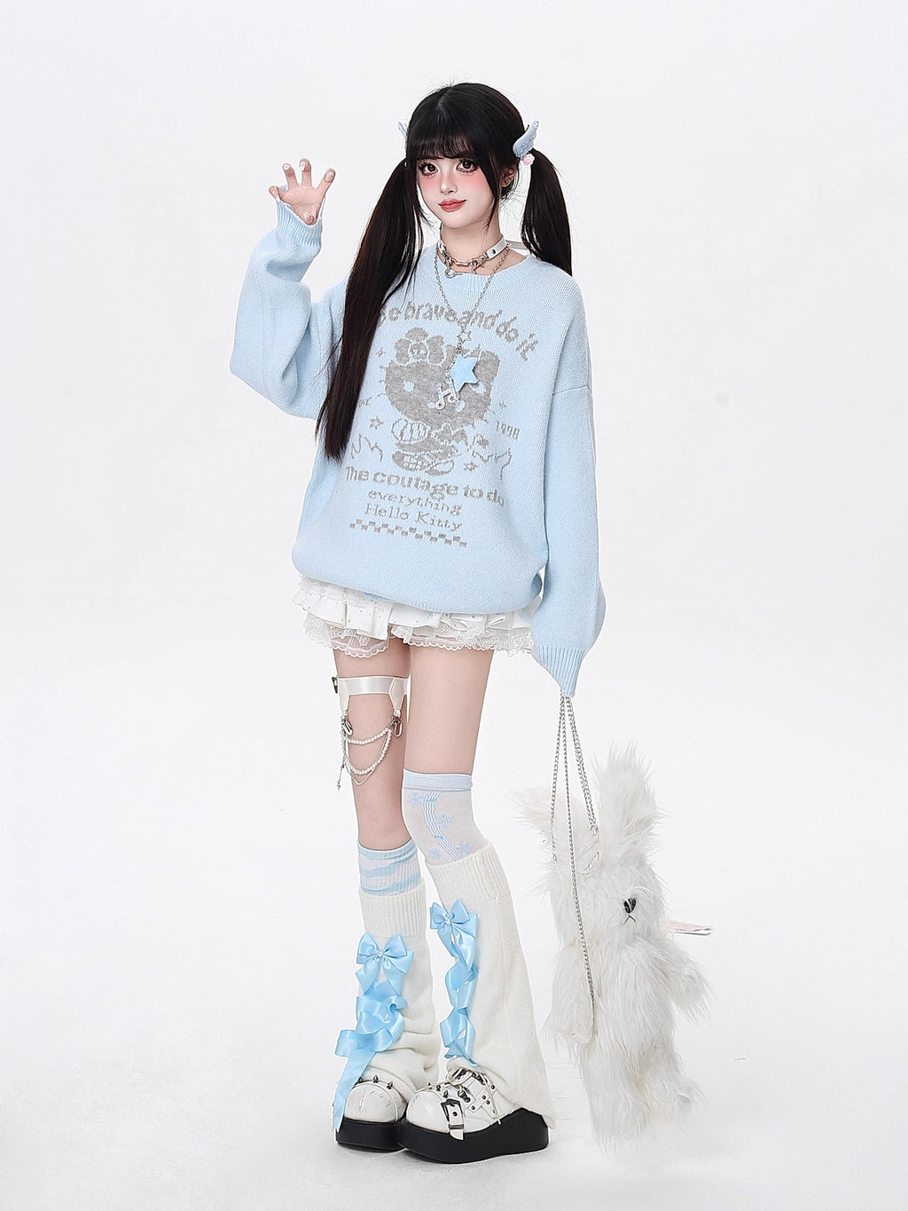 Infused with playful charm, this cozy knit features a sweet kitty print and a relaxed fit for effortless style. The soothing blue and beige palette evokes softness and youthfulness, while the lightweight fabric ensures comfort all day. Perfect for adding a touch of whimsy to your autumn wardrobe.