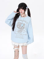 Infused with playful charm, this cozy knit features a sweet kitty print and a relaxed fit for effortless style. The soothing blue and beige palette evokes softness and youthfulness, while the lightweight fabric ensures comfort all day. Perfect for adding a touch of whimsy to your autumn wardrobe.