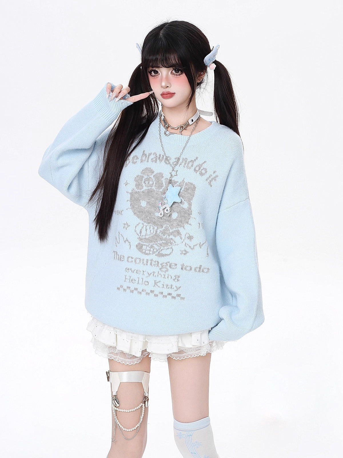 Infused with playful charm, this cozy knit features a sweet kitty print and a relaxed fit for effortless style. The soothing blue and beige palette evokes softness and youthfulness, while the lightweight fabric ensures comfort all day. Perfect for adding a touch of whimsy to your autumn wardrobe.