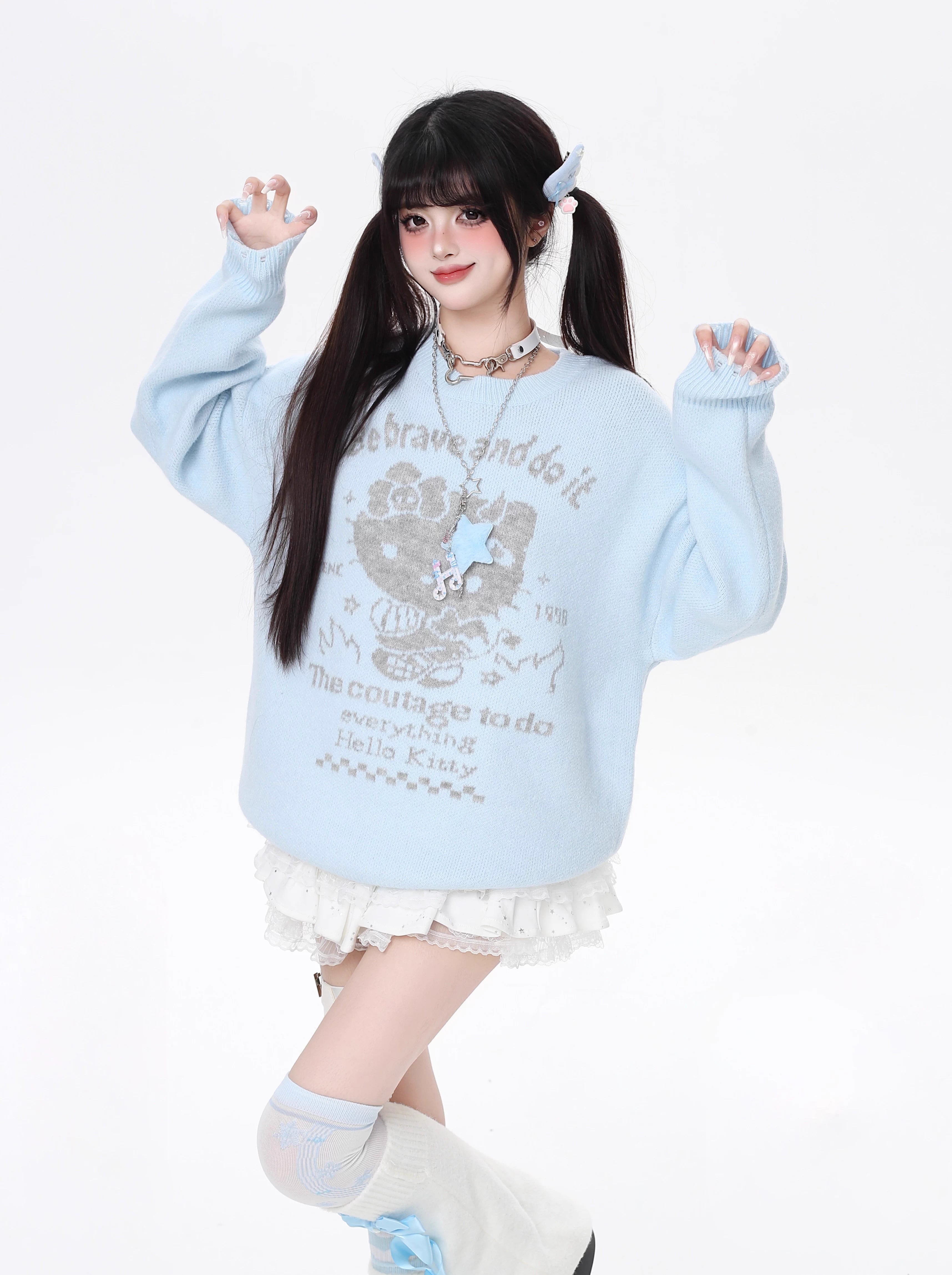 Infused with playful charm, this cozy knit features a sweet kitty print and a relaxed fit for effortless style. The soothing blue and beige palette evokes softness and youthfulness, while the lightweight fabric ensures comfort all day. Perfect for adding a touch of whimsy to your autumn wardrobe.
