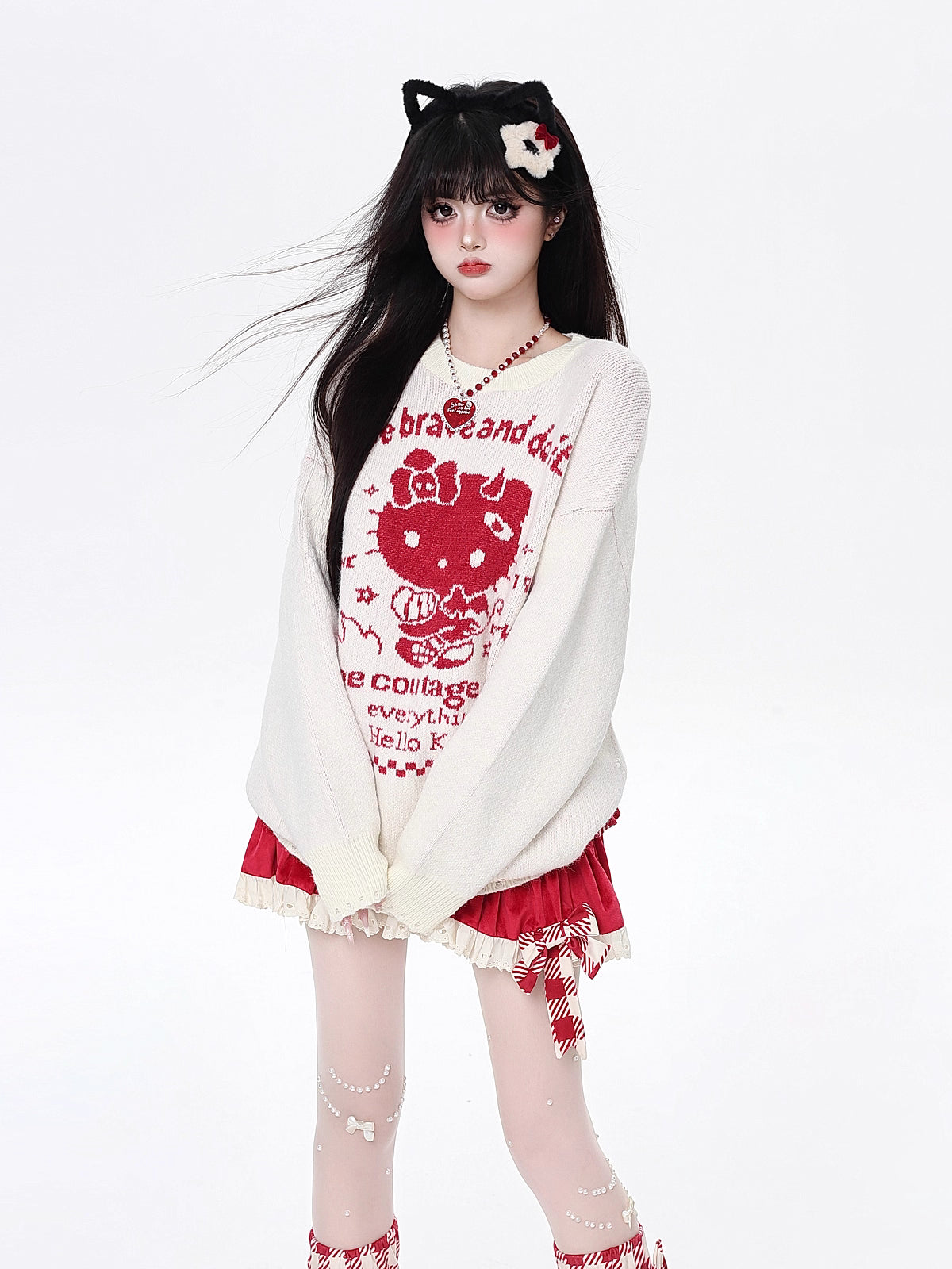 Infused with playful charm, this cozy knit features a sweet kitty print and a relaxed fit for effortless style. The soothing blue and beige palette evokes softness and youthfulness, while the lightweight fabric ensures comfort all day. Perfect for adding a touch of whimsy to your autumn wardrobe.