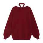 Inspired by a cozy winter's tale, this festive sweater blends a classic Fair Isle pattern with a whimsical rabbit motif. The rich, flattering black and red palette ensures a standout seasonal look. Designed with voluminous lantern sleeves for a touch of vintage charm, it’s the perfect, merry statement piece for holiday cheer and warmth.