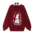 Inspired by a cozy winter's tale, this festive sweater blends a classic Fair Isle pattern with a whimsical rabbit motif. The rich, flattering black and red palette ensures a standout seasonal look. Designed with voluminous lantern sleeves for a touch of vintage charm, it’s the perfect, merry statement piece for holiday cheer and warmth.