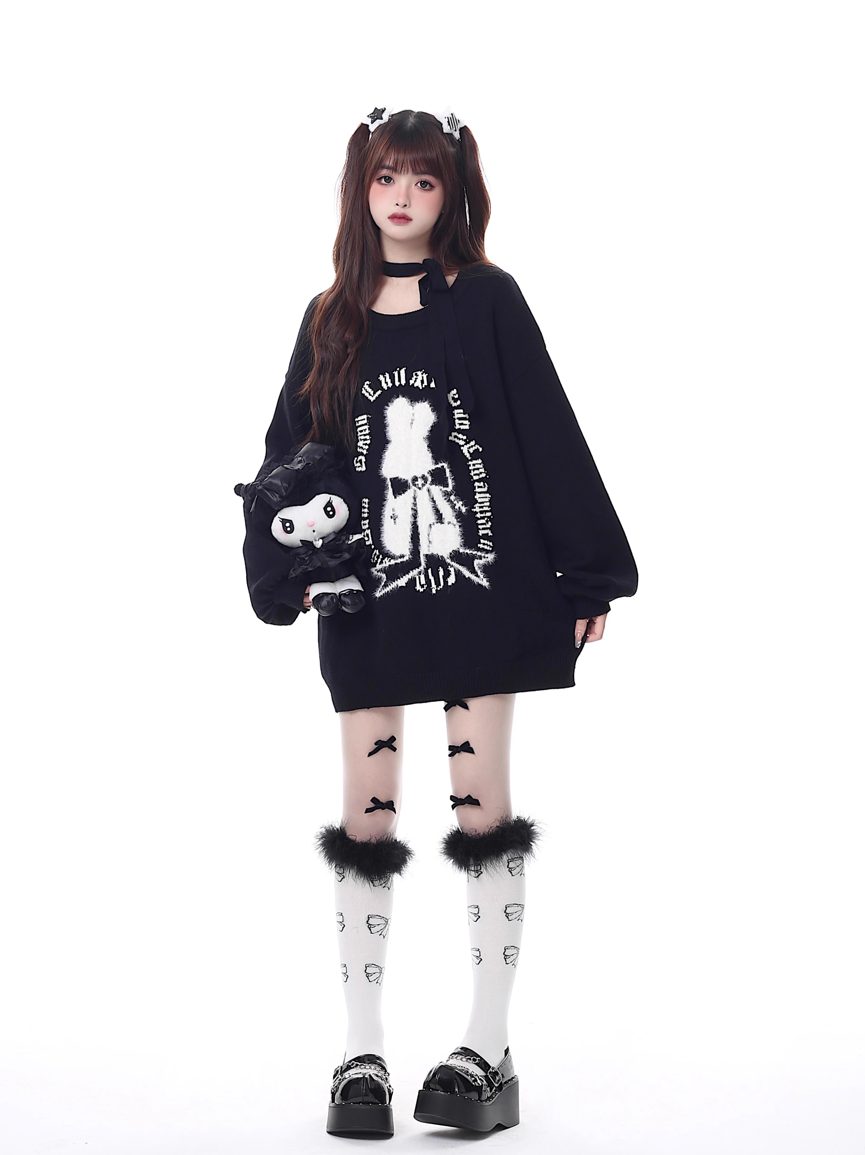 Inspired by a cozy winter's tale, this festive sweater blends a classic Fair Isle pattern with a whimsical rabbit motif. The rich, flattering black and red palette ensures a standout seasonal look. Designed with voluminous lantern sleeves for a touch of vintage charm, it’s the perfect, merry statement piece for holiday cheer and warmth.