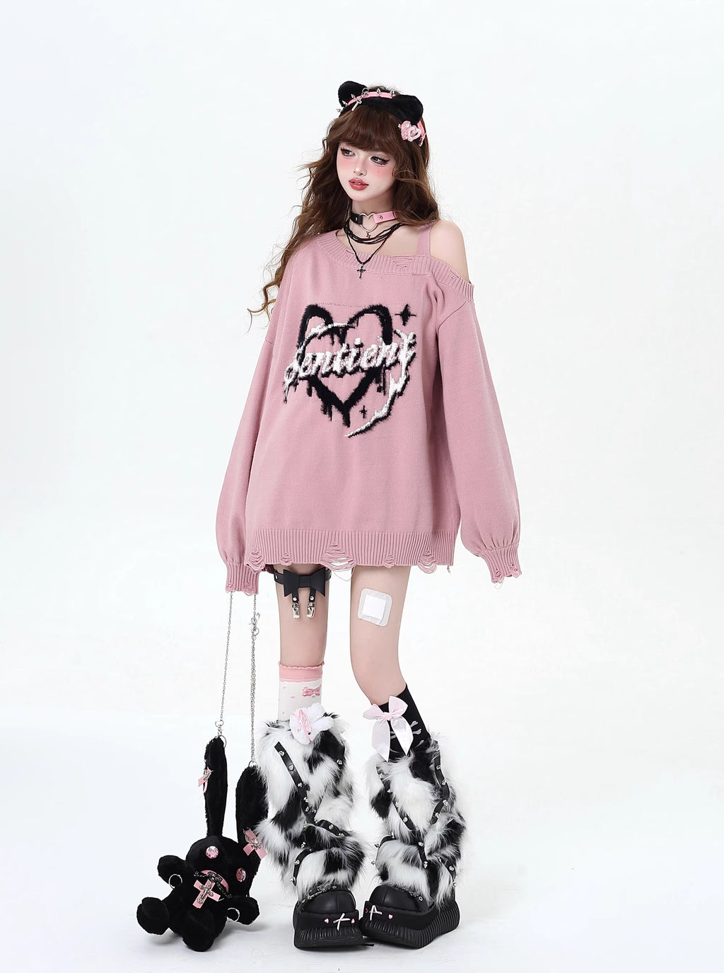 This sweater captures the erratic pulse of youthful emotion with a soft, dropped-shoulder silhouette. The muted blue and pink palette feels both nostalgic and rebellious, perfect for expressing a tender, offbeat identity. It’s a cozy yet bold statement for introverts dreaming in color.