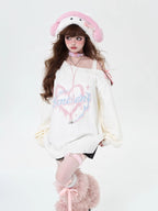 This sweater captures the erratic pulse of youthful emotion with a soft, dropped-shoulder silhouette. The muted blue and pink palette feels both nostalgic and rebellious, perfect for expressing a tender, offbeat identity. It’s a cozy yet bold statement for introverts dreaming in color.