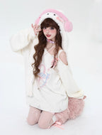 This sweater captures the erratic pulse of youthful emotion with a soft, dropped-shoulder silhouette. The muted blue and pink palette feels both nostalgic and rebellious, perfect for expressing a tender, offbeat identity. It’s a cozy yet bold statement for introverts dreaming in color.