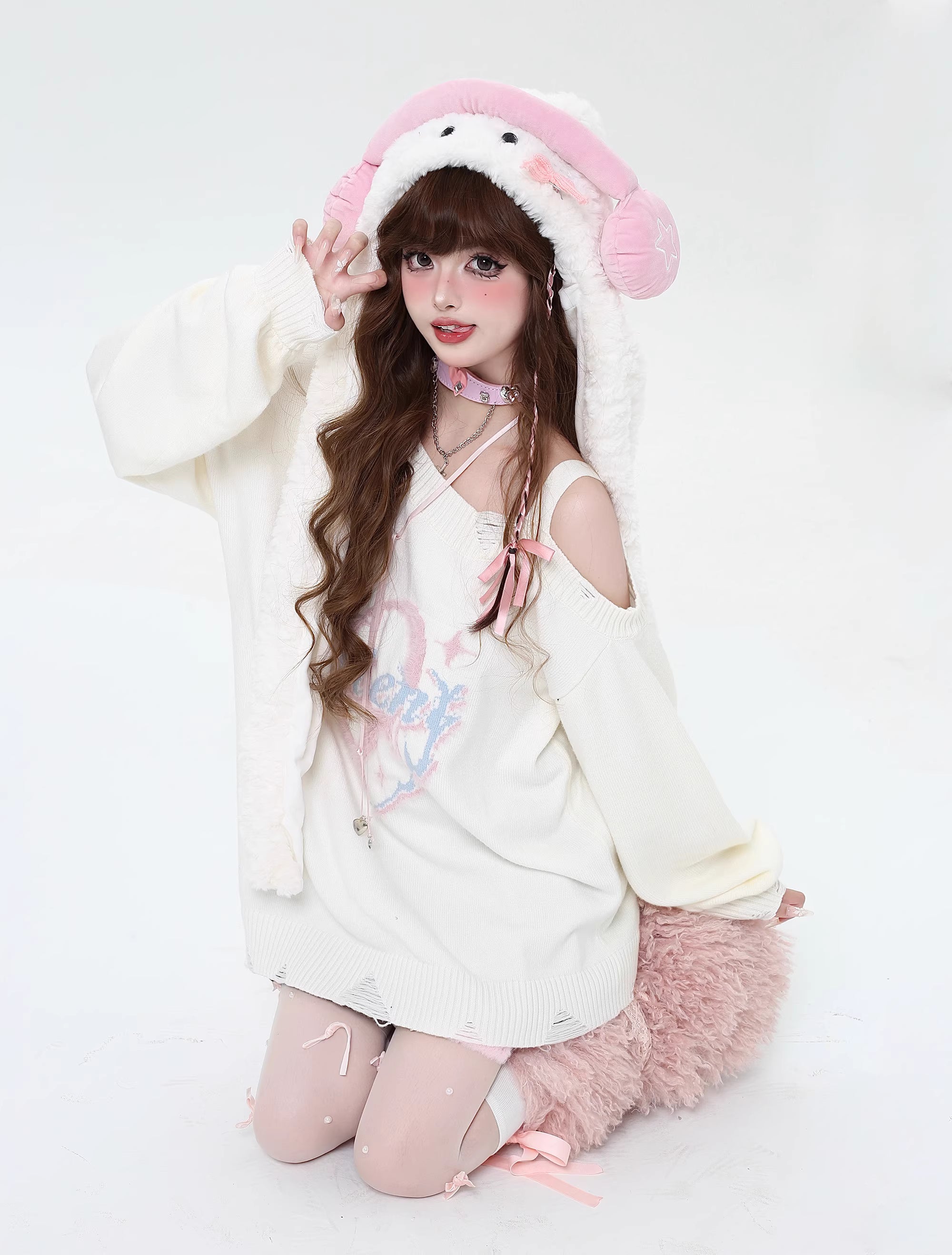 This sweater captures the erratic pulse of youthful emotion with a soft, dropped-shoulder silhouette. The muted blue and pink palette feels both nostalgic and rebellious, perfect for expressing a tender, offbeat identity. It’s a cozy yet bold statement for introverts dreaming in color.