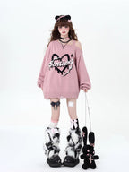 This sweater captures the erratic pulse of youthful emotion with a soft, dropped-shoulder silhouette. The muted blue and pink palette feels both nostalgic and rebellious, perfect for expressing a tender, offbeat identity. It’s a cozy yet bold statement for introverts dreaming in color.