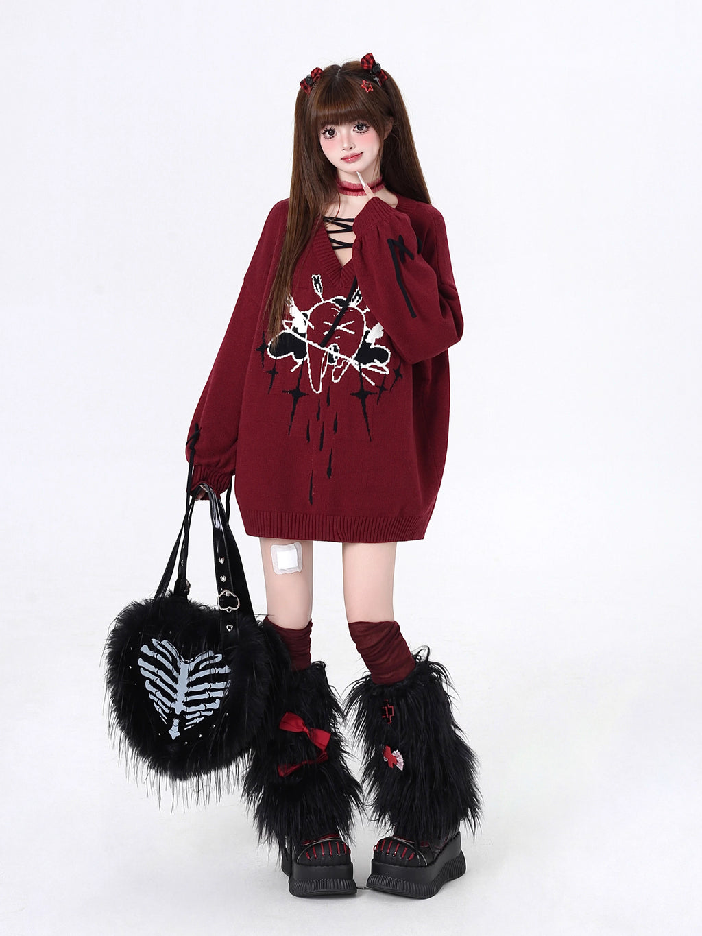 This sweater channels raw, post-breakup emotion into wearable alt-culture art. The bold V-neck and relaxed fit offer effortless cool, while the stark red, black, and white palette screams rebellious elegance. It’s for those who wear their heartbreak like armor—soft on the inside, fiercely unique on the outside.
