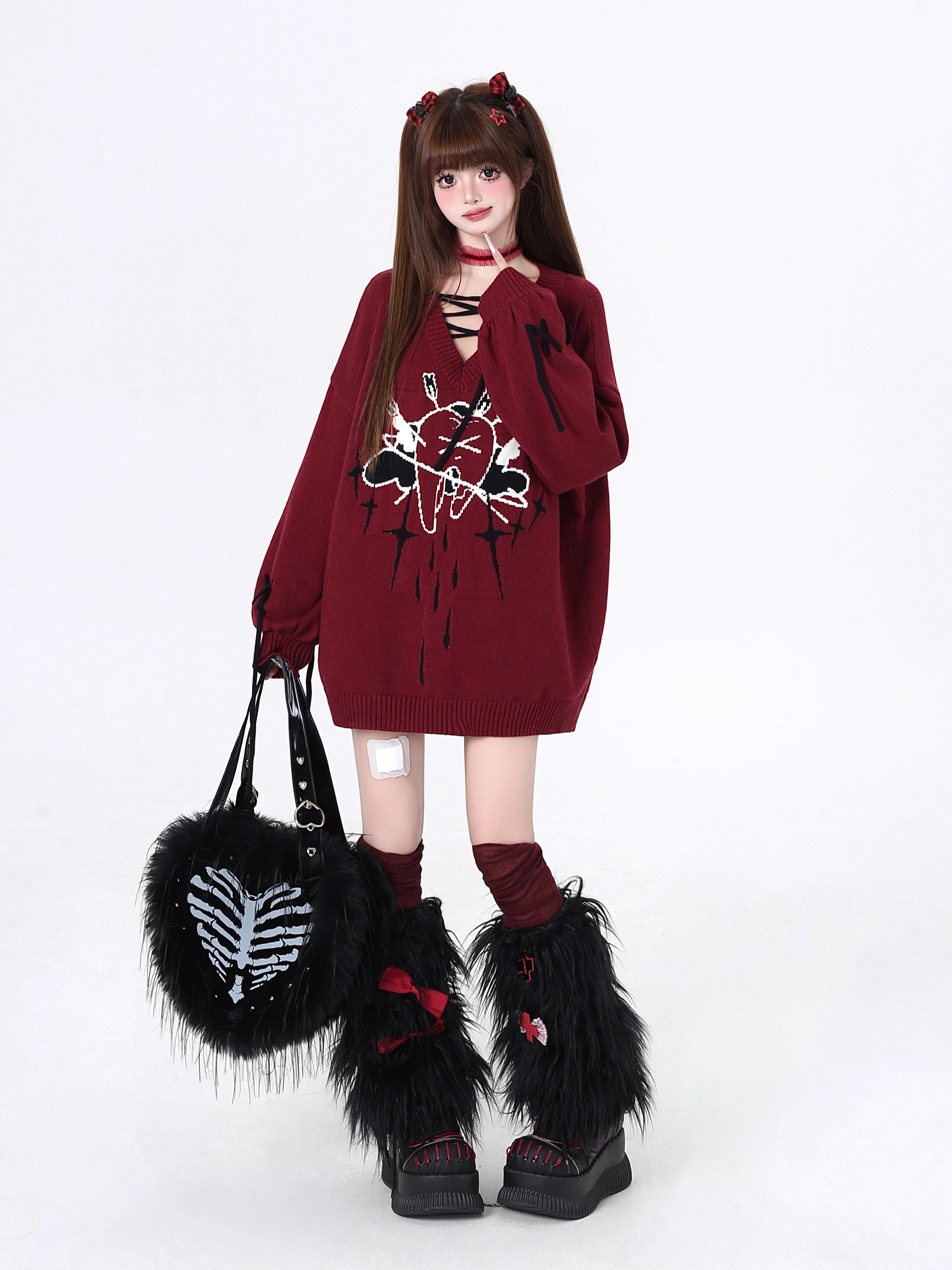 This sweater channels raw, post-breakup emotion into wearable alt-culture art. The bold V-neck and relaxed fit offer effortless cool, while the stark red, black, and white palette screams rebellious elegance. It’s for those who wear their heartbreak like armor—soft on the inside, fiercely unique on the outside.