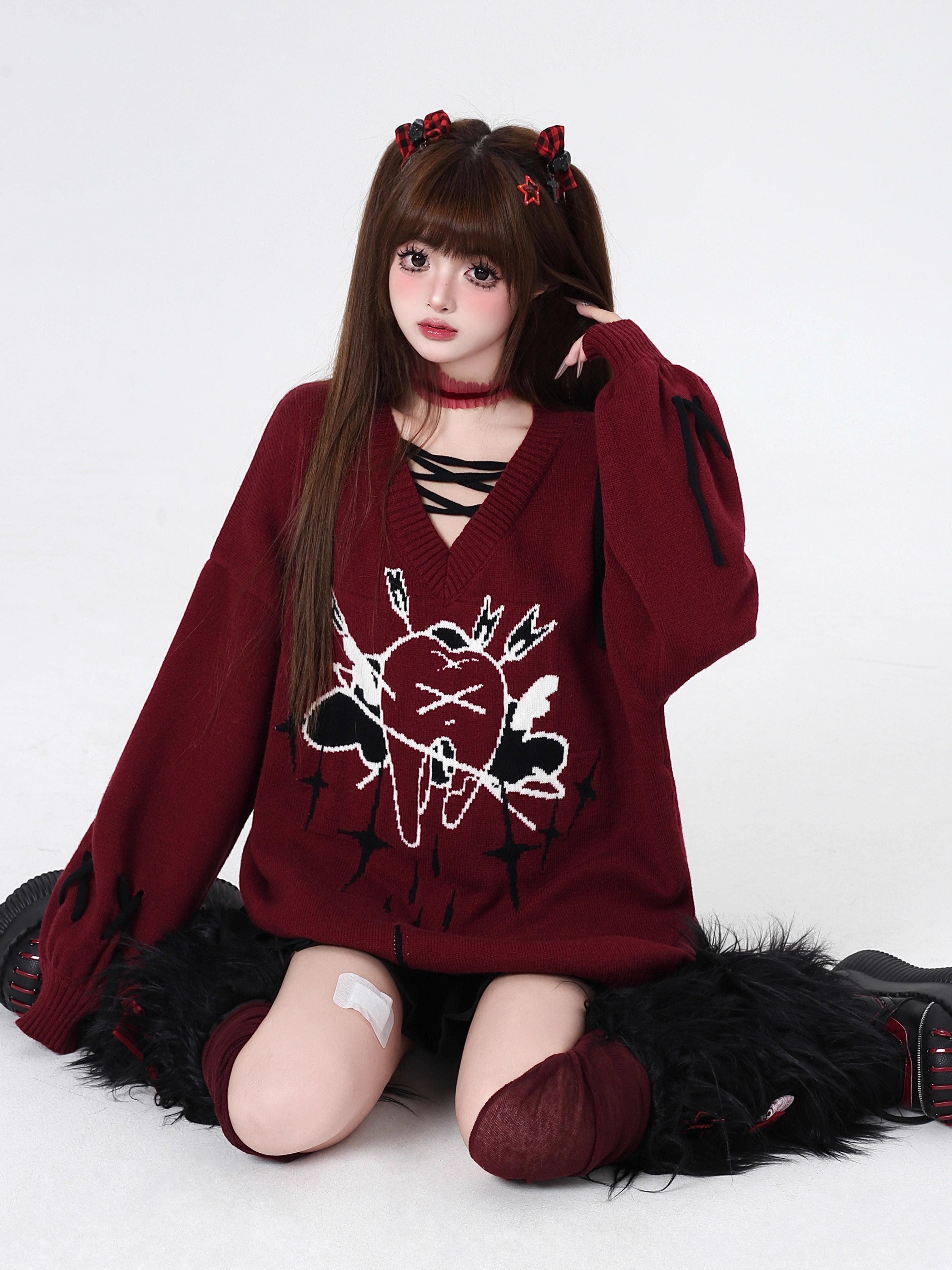 This sweater channels raw, post-breakup emotion into wearable alt-culture art. The bold V-neck and relaxed fit offer effortless cool, while the stark red, black, and white palette screams rebellious elegance. It’s for those who wear their heartbreak like armor—soft on the inside, fiercely unique on the outside.