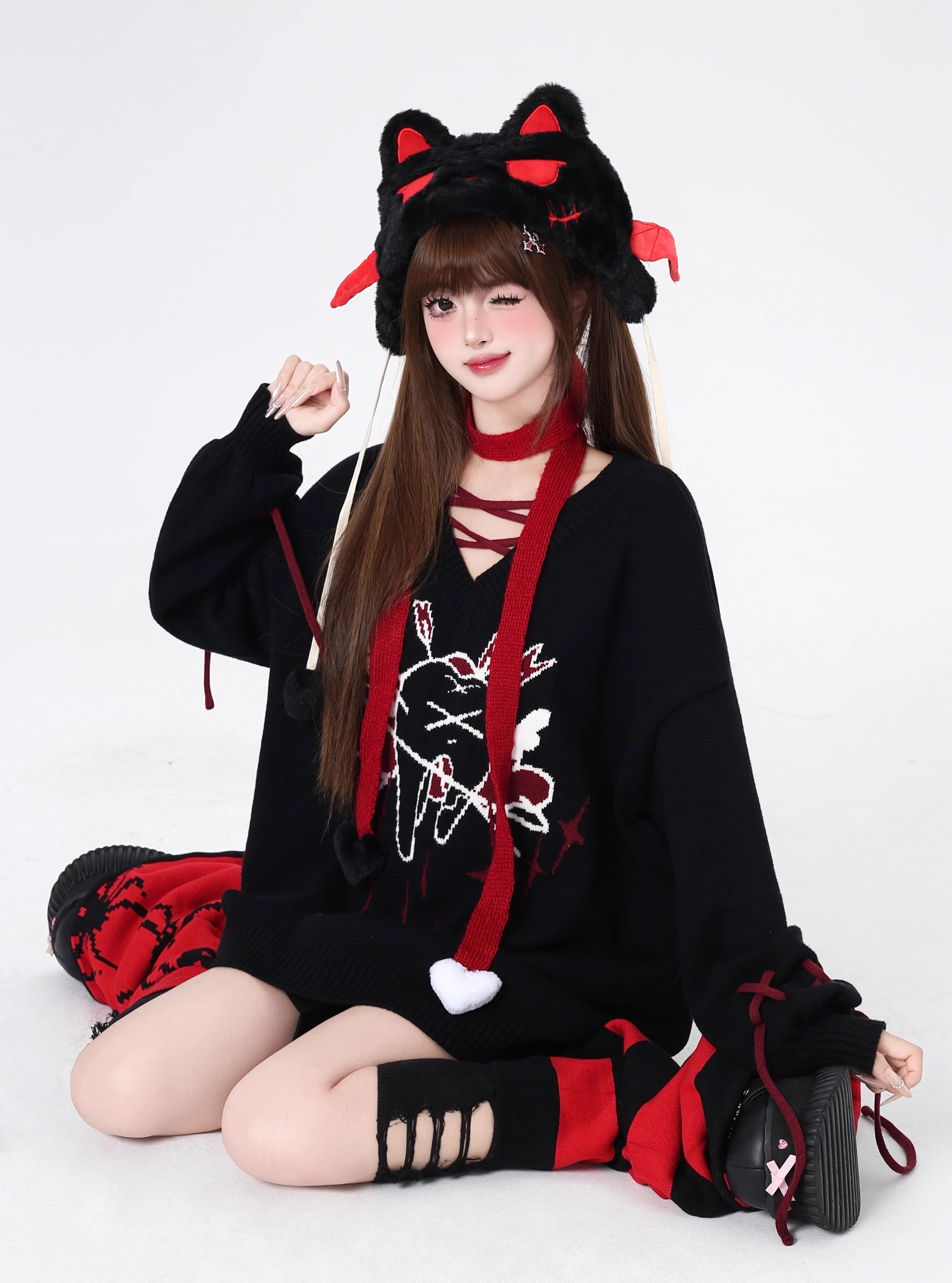 This sweater channels raw, post-breakup emotion into wearable alt-culture art. The bold V-neck and relaxed fit offer effortless cool, while the stark red, black, and white palette screams rebellious elegance. It’s for those who wear their heartbreak like armor—soft on the inside, fiercely unique on the outside.