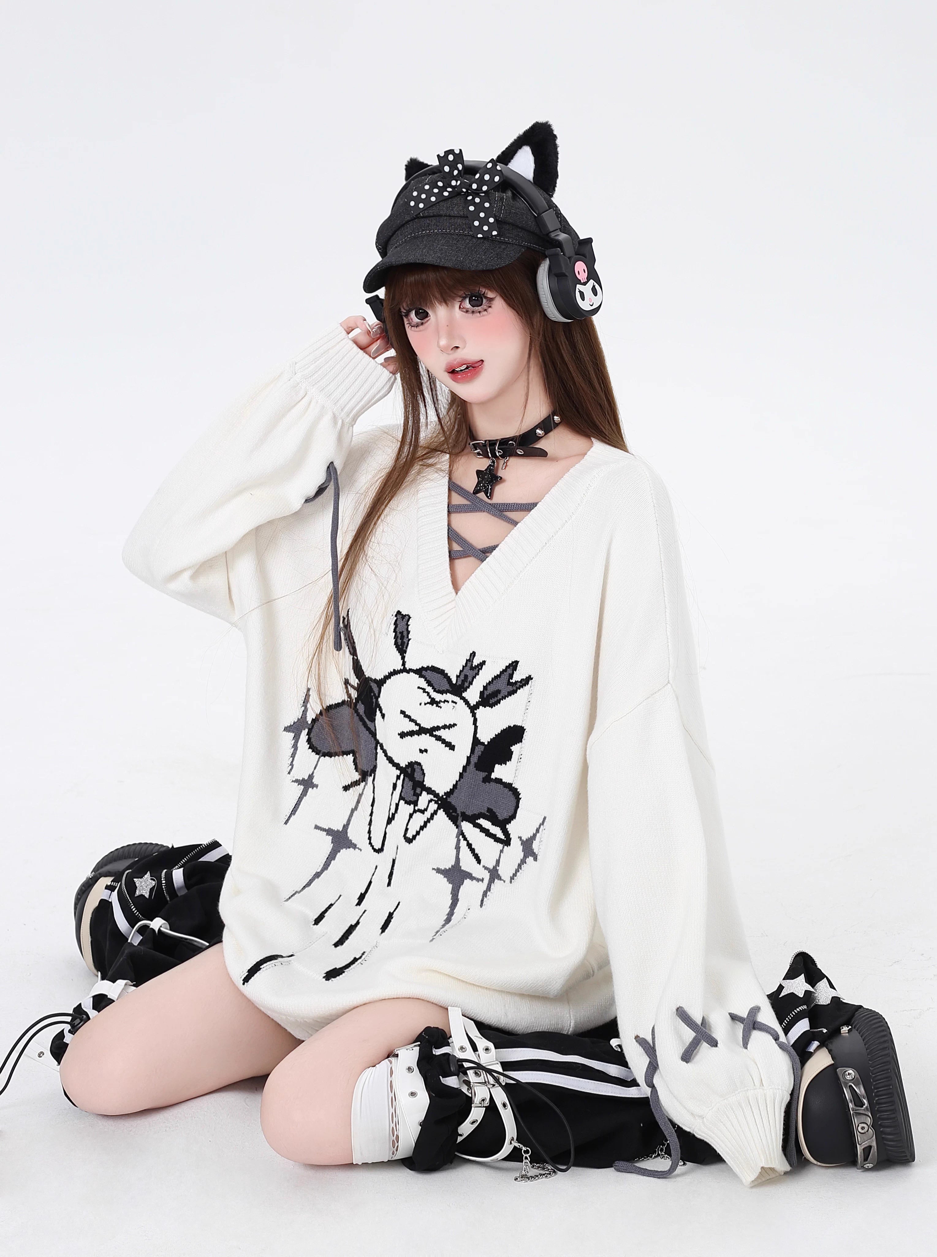 This sweater channels raw, post-breakup emotion into wearable alt-culture art. The bold V-neck and relaxed fit offer effortless cool, while the stark red, black, and white palette screams rebellious elegance. It’s for those who wear their heartbreak like armor—soft on the inside, fiercely unique on the outside.