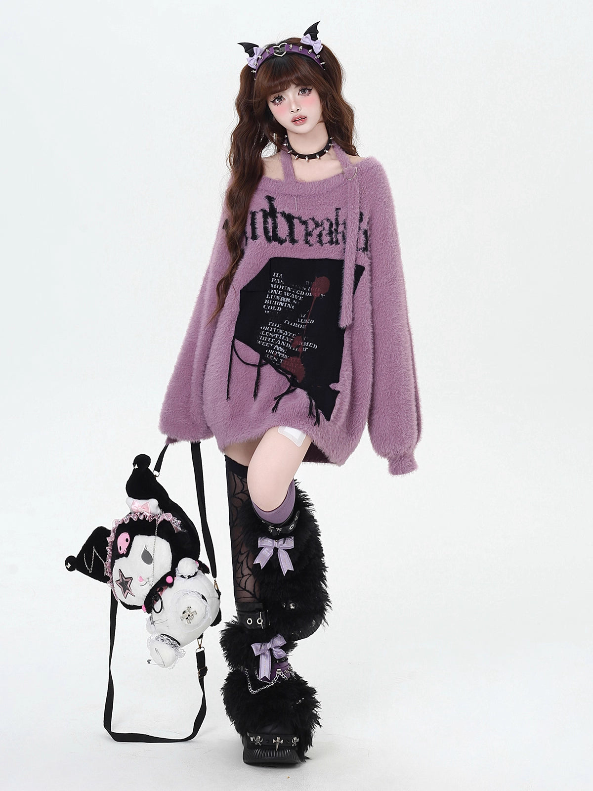 Mixing delicate luxury with downtown edge, this slouchy asymmetric sweater redefines romantic rebellion. Ultra-soft faux fur blends with a provocative off-shoulder cut, while the intense black and red palette whispers passion and defiance. For the dreamer who isn’t afraid to break a few rules.
