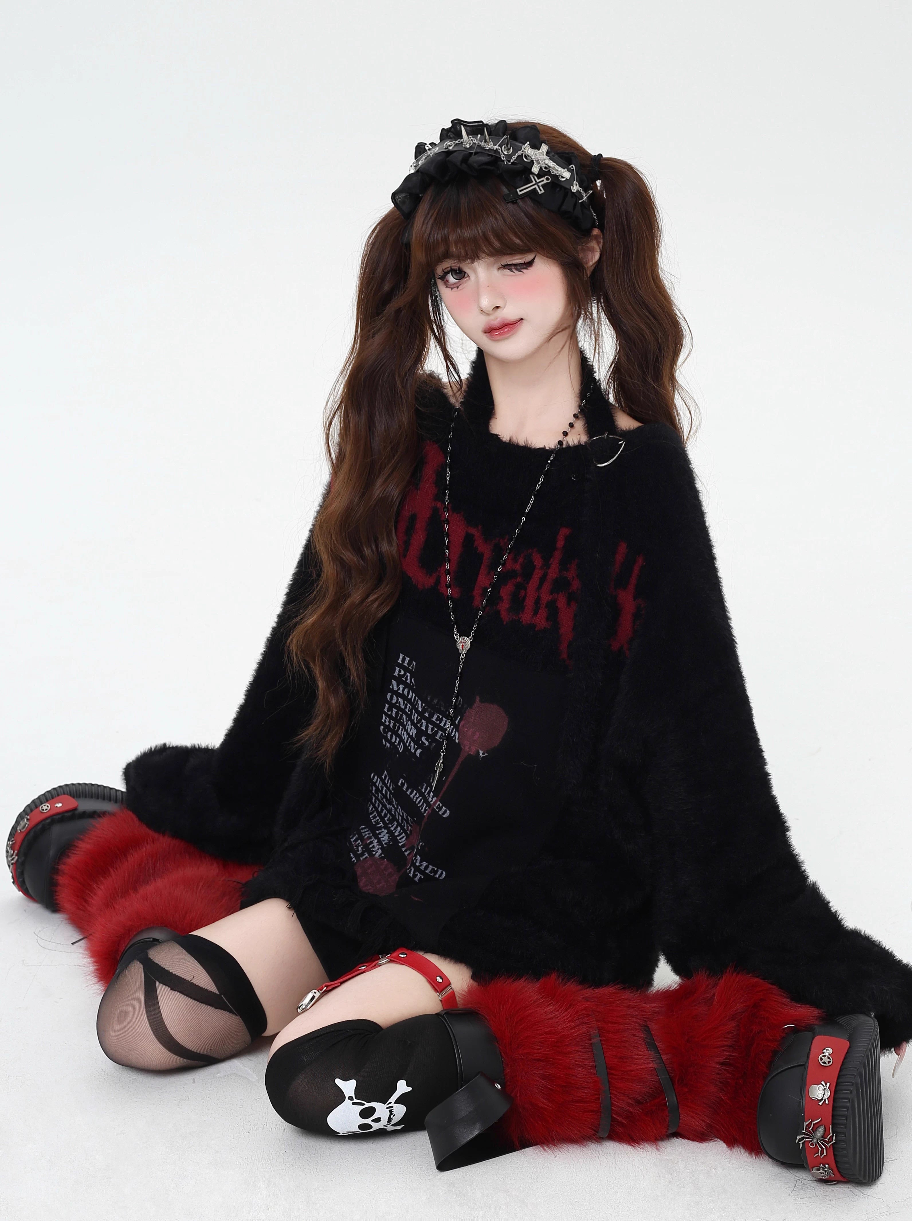 Mixing delicate luxury with downtown edge, this slouchy asymmetric sweater redefines romantic rebellion. Ultra-soft faux fur blends with a provocative off-shoulder cut, while the intense black and red palette whispers passion and defiance. For the dreamer who isn’t afraid to break a few rules.