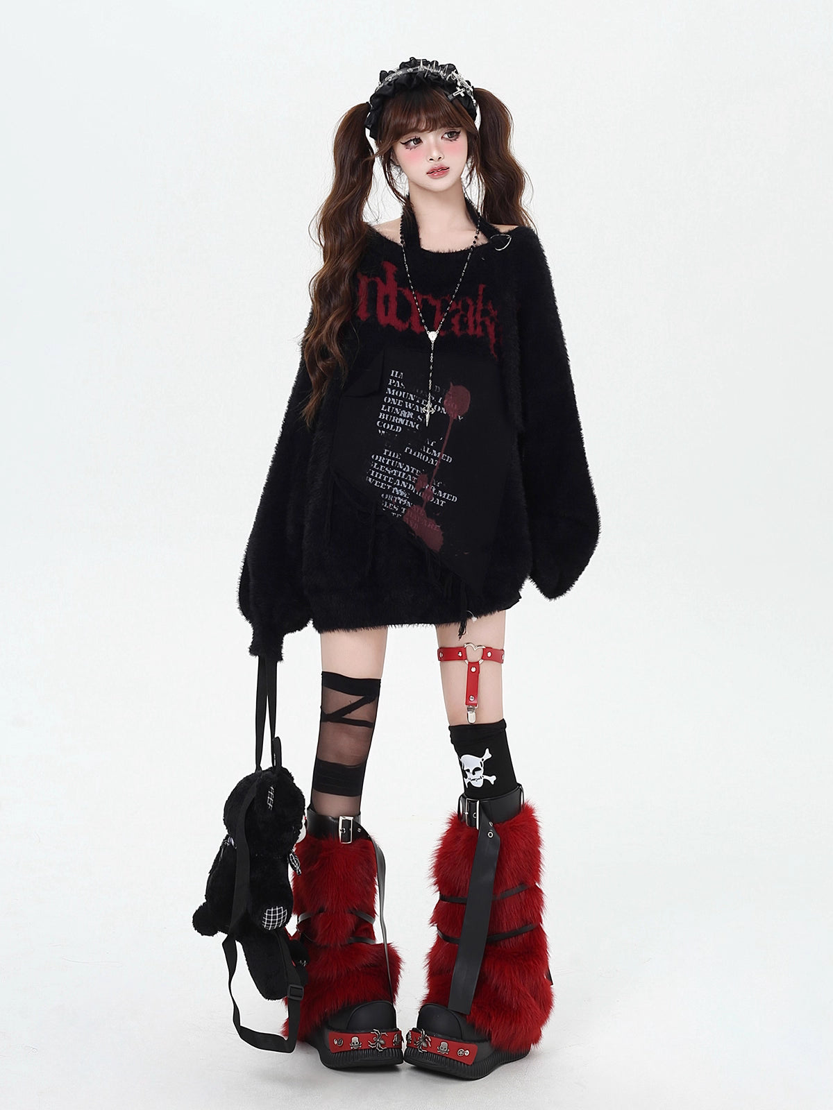 Mixing delicate luxury with downtown edge, this slouchy asymmetric sweater redefines romantic rebellion. Ultra-soft faux fur blends with a provocative off-shoulder cut, while the intense black and red palette whispers passion and defiance. For the dreamer who isn’t afraid to break a few rules.
