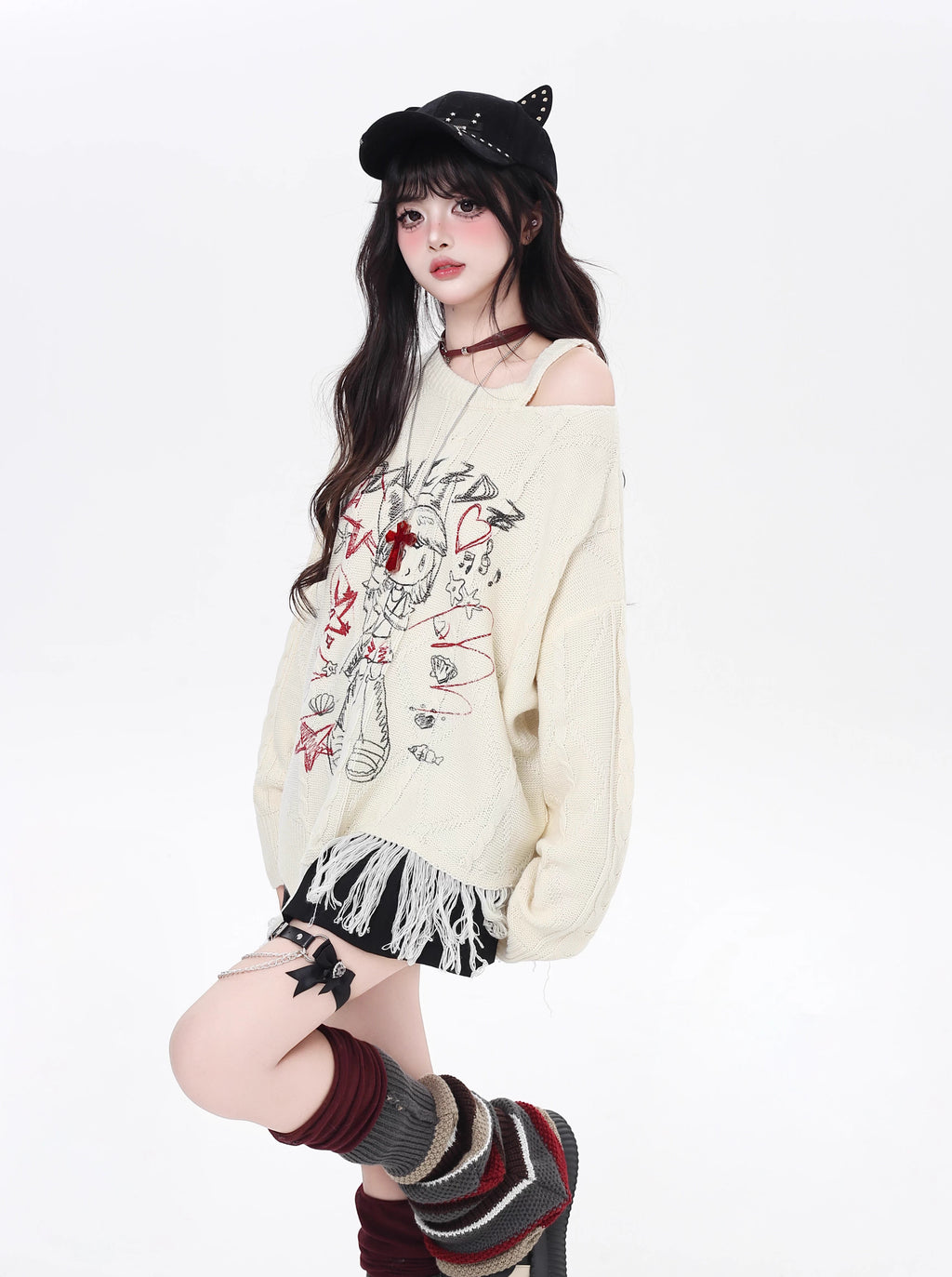 This sweater blends street art energy with bohemian flair. Raw-cut fringe, abstract cartoon graffiti, and an intentionally irregular silhouette create a look that's both playful and rebellious. Soft, slouchy, and effortlessly cool—for those who wear their creativity on their sleeve.