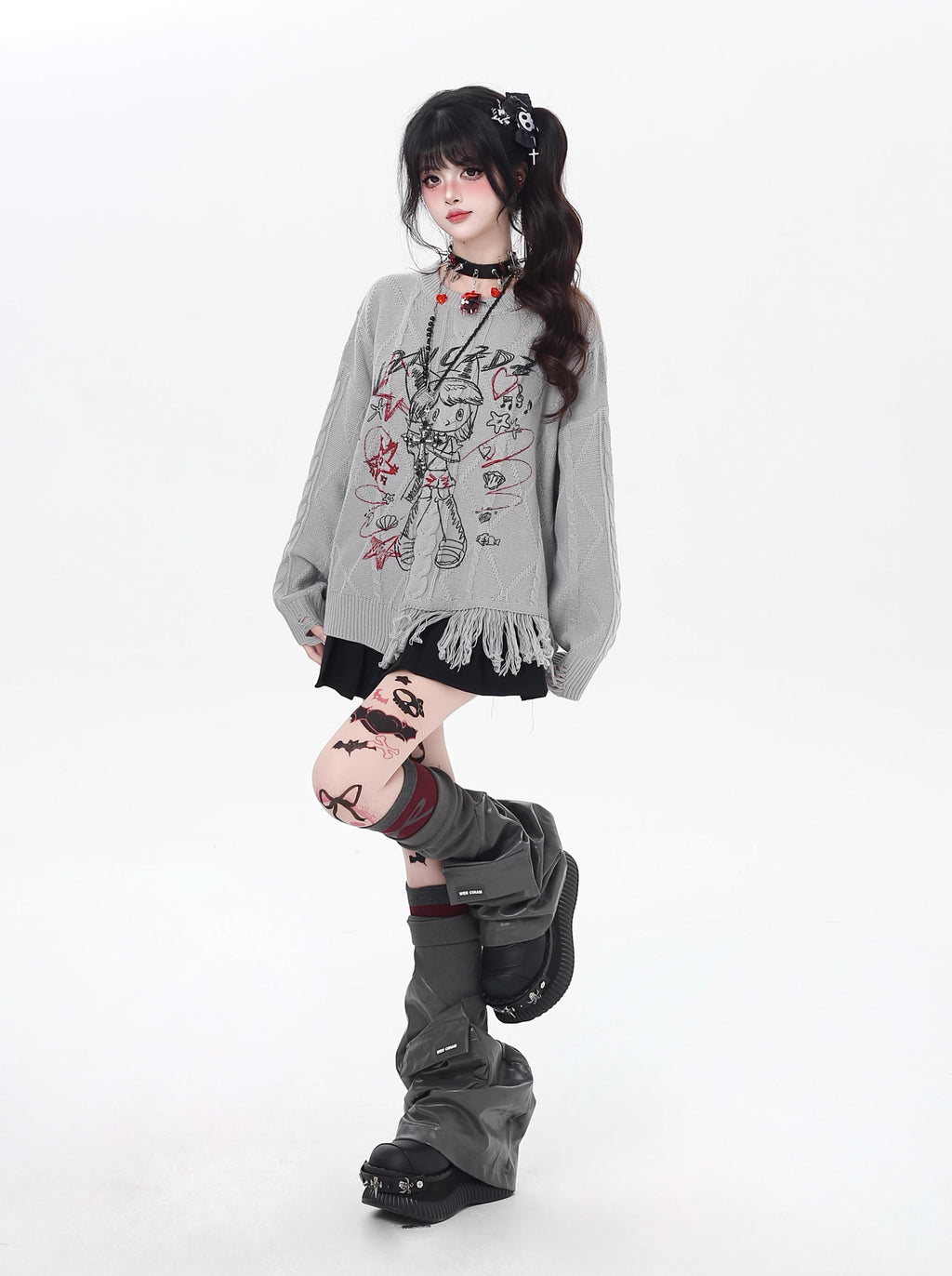 This sweater blends street art energy with bohemian flair. Raw-cut fringe, abstract cartoon graffiti, and an intentionally irregular silhouette create a look that's both playful and rebellious. Soft, slouchy, and effortlessly cool—for those who wear their creativity on their sleeve.