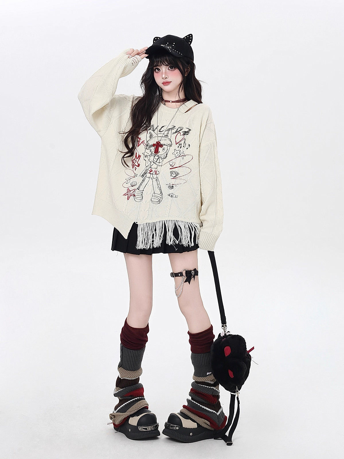 This sweater blends street art energy with bohemian flair. Raw-cut fringe, abstract cartoon graffiti, and an intentionally irregular silhouette create a look that's both playful and rebellious. Soft, slouchy, and effortlessly cool—for those who wear their creativity on their sleeve.