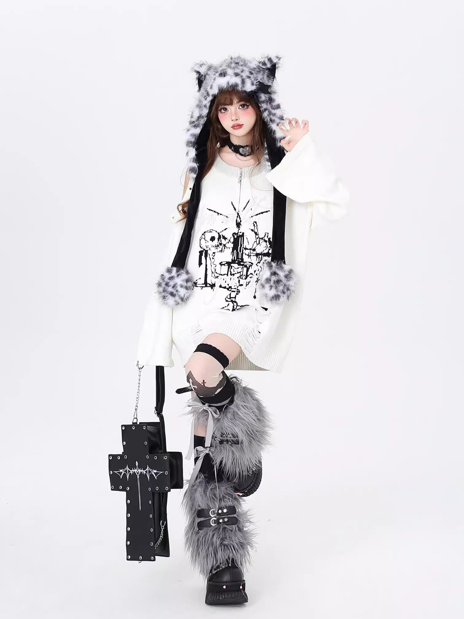 Embrace your inner anti-hero with this edgy, drop-shoulder sweater. Featuring rebellious punk-inspired details and a stark black-and-white palette, it’s designed for those who defy conventions. Soft yet bold, it’s the perfect piece to channel dark romanticism and effortless cool during crisp Winter days.
