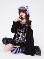 Embrace your inner anti-hero with this edgy, drop-shoulder sweater. Featuring rebellious punk-inspired details and a stark black-and-white palette, it’s designed for those who defy conventions. Soft yet bold, it’s the perfect piece to channel dark romanticism and effortless cool during crisp Winter days.