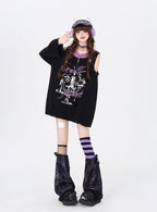 Embrace your inner anti-hero with this edgy, drop-shoulder sweater. Featuring rebellious punk-inspired details and a stark black-and-white palette, it’s designed for those who defy conventions. Soft yet bold, it’s the perfect piece to channel dark romanticism and effortless cool during crisp Winter days.