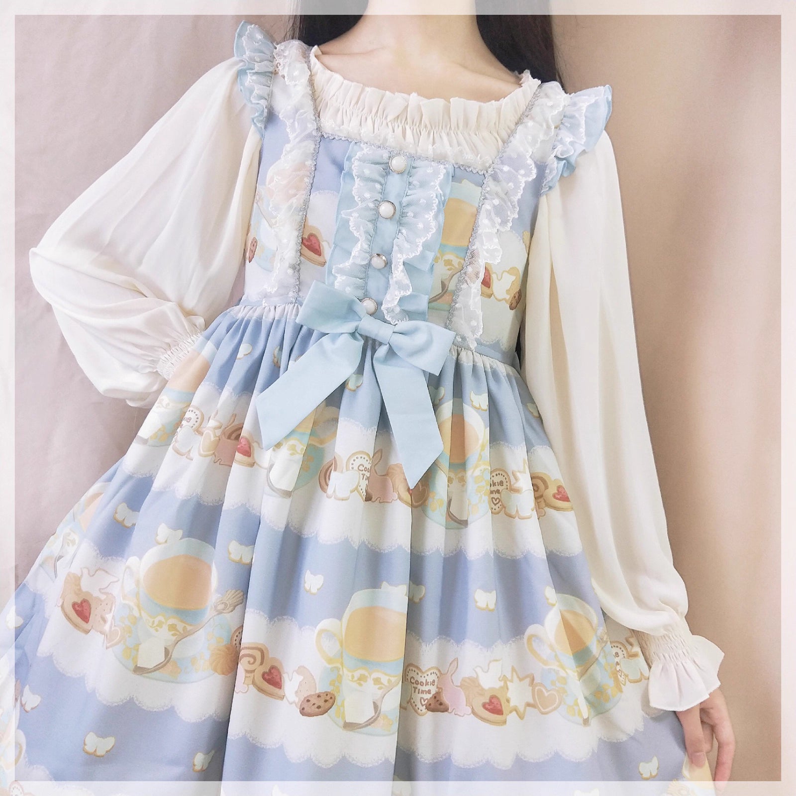 This lightweight chiffon blouse combines a classic round neck with soft puff sleeves for effortless elegance. The flowing fabric and relaxed silhouette offer versatile comfort, perfect for daily layering under jumpers or dresses. Its delicate drape and subtle sheen create a romantic foundation for both sweet and classic Lolita coordinates, blending practicality with dreamy sophistication.