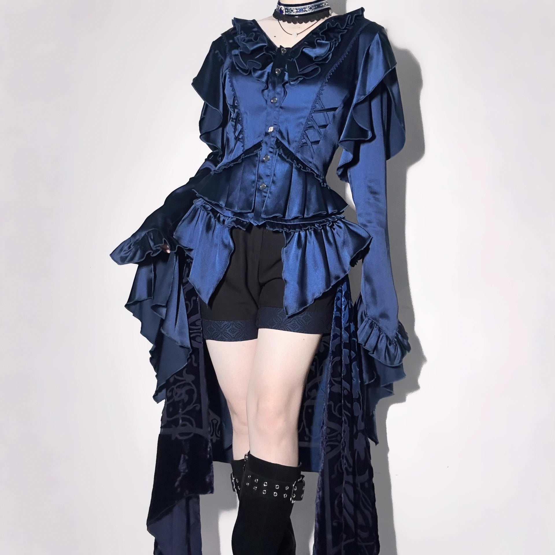 This Lolita blouse masterfully merges vintage elegance with medieval charm, crafted in a striking prince-style design. Rendered in timeless black and white, it features meticulous tailoring for a structured yet comfortable loose fit. Ideal for layering, cosplay, or themed events, it pairs effortlessly with skirts or trousers. This piece embodies dark romanticism, blending historical inspiration with contemporary Gothic Lolita sophistication for a truly versatile statement.