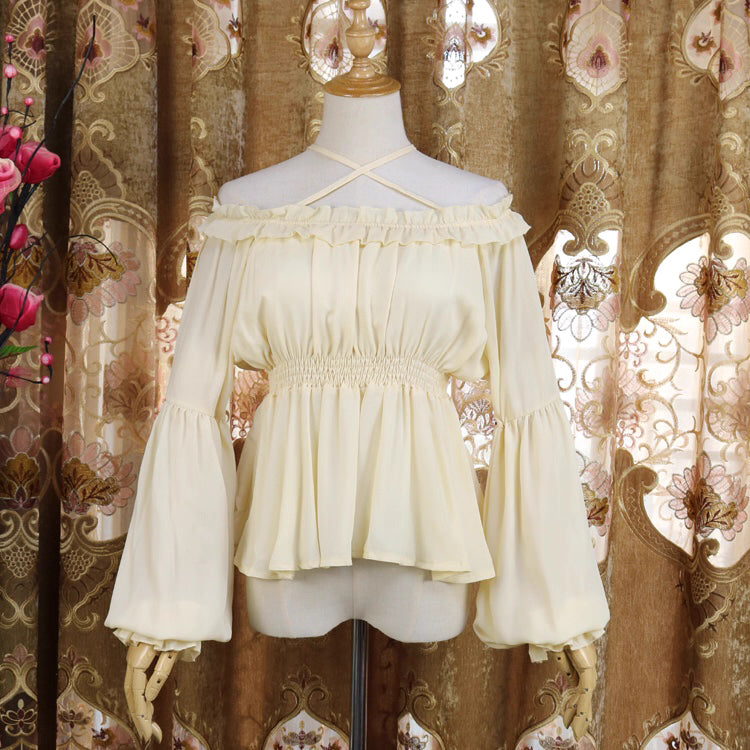 Inspired by Japanese sweet style, this airy chiffon blouse features a delicate halter neck and playful bubble sleeves. The lightweight fabric drapes softly for a dreamy silhouette, perfect for layering under sundresses or jumpers. Its whimsical design combines youthful charm with elegant details, making it ideal for creating kawaii Lolita coordinates with a touch of romantic freshness.