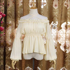 Inspired by Japanese sweet style, this airy chiffon blouse features a delicate halter neck and playful bubble sleeves. The lightweight fabric drapes softly for a dreamy silhouette, perfect for layering under sundresses or jumpers. Its whimsical design combines youthful charm with elegant details, making it ideal for creating kawaii Lolita coordinates with a touch of romantic freshness.