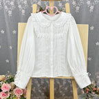Design Concept:
This Lolita blouse is crafted from soft, breathable cotton, featuring a charming stand collar and long sleeves for a refined yet sweet look. Available in&nbsp;Beige, Black, and White, it combines classic Lolita elegance with a playful, doll-like aesthetic. The tailored silhouette and delicate detailing make it perfect for layering under jumpers, dresses, or wearing on its own for daily outings or tea parties.