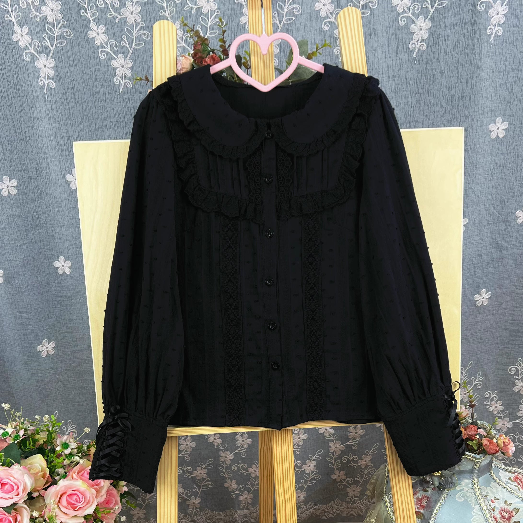 Design Concept:
This Lolita blouse is crafted from soft, breathable cotton, featuring a charming stand collar and long sleeves for a refined yet sweet look. Available in&nbsp;Beige, Black, and White, it combines classic Lolita elegance with a playful, doll-like aesthetic. The tailored silhouette and delicate detailing make it perfect for layering under jumpers, dresses, or wearing on its own for daily outings or tea parties.