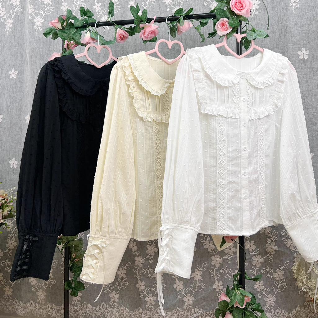 Design Concept:
This Lolita blouse is crafted from soft, breathable cotton, featuring a charming stand collar and long sleeves for a refined yet sweet look. Available in&nbsp;Beige, Black, and White, it combines classic Lolita elegance with a playful, doll-like aesthetic. The tailored silhouette and delicate detailing make it perfect for layering under jumpers, dresses, or wearing on its own for daily outings or tea parties.