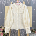 Design Concept:
This Lolita blouse is crafted from soft, breathable cotton, featuring a charming stand collar and long sleeves for a refined yet sweet look. Available in&nbsp;Beige, Black, and White, it combines classic Lolita elegance with a playful, doll-like aesthetic. The tailored silhouette and delicate detailing make it perfect for layering under jumpers, dresses, or wearing on its own for daily outings or tea parties.
