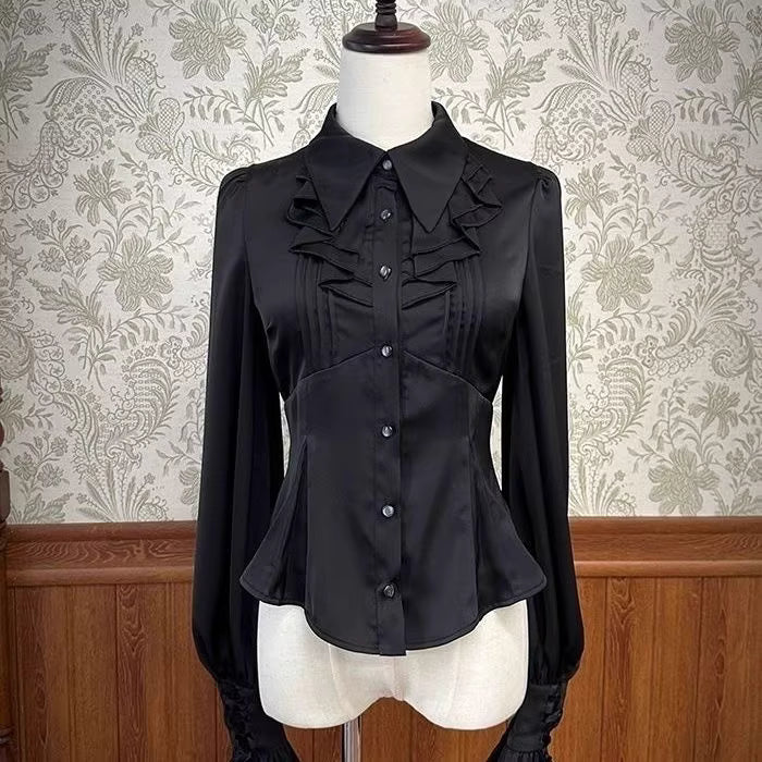 Inspired by the delicate charm of a dollhouse aesthetic, this long-sleeve Lolita blouse combines minimalist elegance with functional design. Crafted in pure white and classic black with a graceful drape, it features adjustable tie details for customizable silhouettes. The versatile piece offers a comfortable fit for daily wear, effortlessly layering under jumpers or pairing with high-waisted skirts. Its subtle sophistication makes it ideal for both sweet and Gothic Lolita coordinations, blending timeless pu