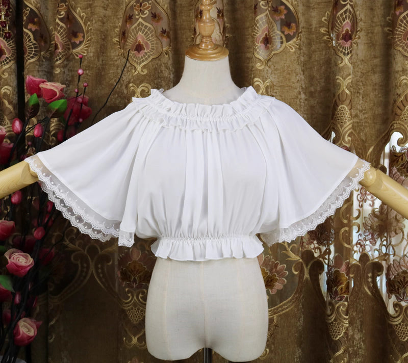Named "Feiyang", this blouse captures movement and grace with its flowing chiffon fabric and delicate flutter sleeves. The airy design creates an ethereal silhouette, perfect for layering under jumpers or dresses. Its minimalist yet magical style blends softness and lightness, making it ideal for adding a touch of fairy-like elegance to sweet or classic Lolita coordinates.