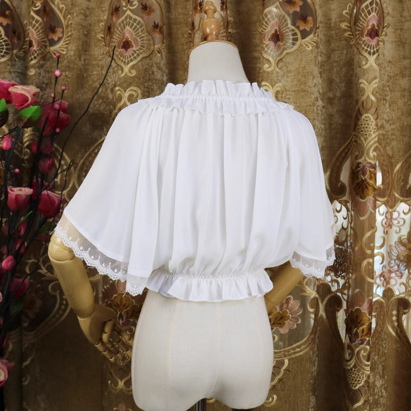 Named "Feiyang", this blouse captures movement and grace with its flowing chiffon fabric and delicate flutter sleeves. The airy design creates an ethereal silhouette, perfect for layering under jumpers or dresses. Its minimalist yet magical style blends softness and lightness, making it ideal for adding a touch of fairy-like elegance to sweet or classic Lolita coordinates.