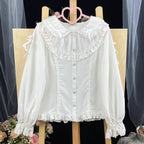 This exquisite Lolita blouse showcases a heavily detailed Peter Pan collar with intricate lace and embroidery. Rendered in vibrant red, pure white, and classic black, its long sleeves and tailored fit offer a perfect balance of sweetness and sophistication. The luxurious craftsmanship makes it ideal for creating striking coordinations, blending doll-like charm with elegant versatility for both daily wear and special occasions.