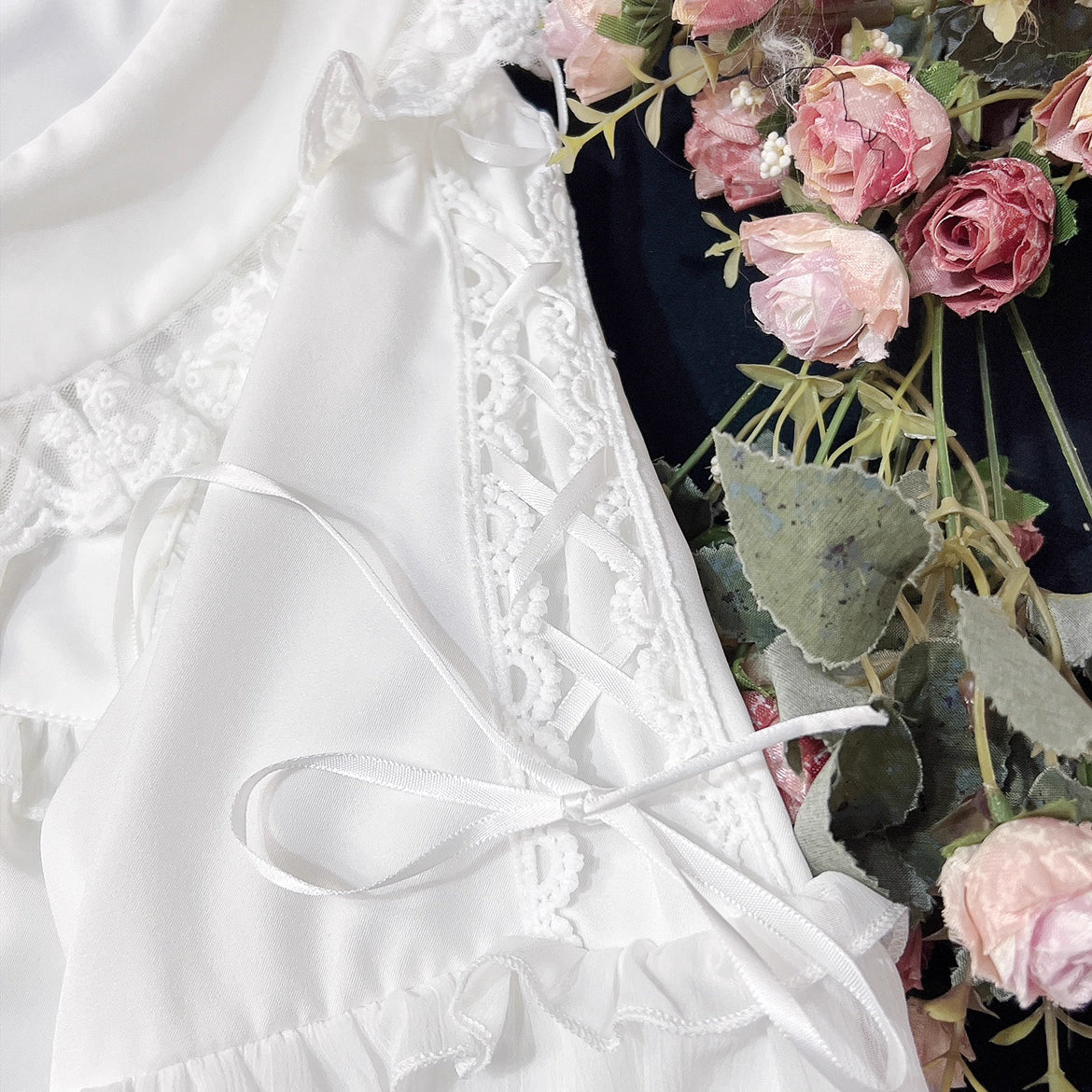 Embodying the freshness of spring, this delicate blouse features a lace-trimmed doll collar adorned with satin ribbons and soft bishop sleeves. The lightweight fabric and sweet design make it perfect for layering under jumpers or dresses. Its romantic details capture a whimsical, youthful charm, ideal for creating enchanting coordinations that blend vintage elegance with modern Lolita sweetness.