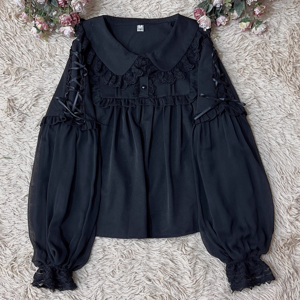 Embodying the freshness of spring, this delicate blouse features a lace-trimmed doll collar adorned with satin ribbons and soft bishop sleeves. The lightweight fabric and sweet design make it perfect for layering under jumpers or dresses. Its romantic details capture a whimsical, youthful charm, ideal for creating enchanting coordinations that blend vintage elegance with modern Lolita sweetness.