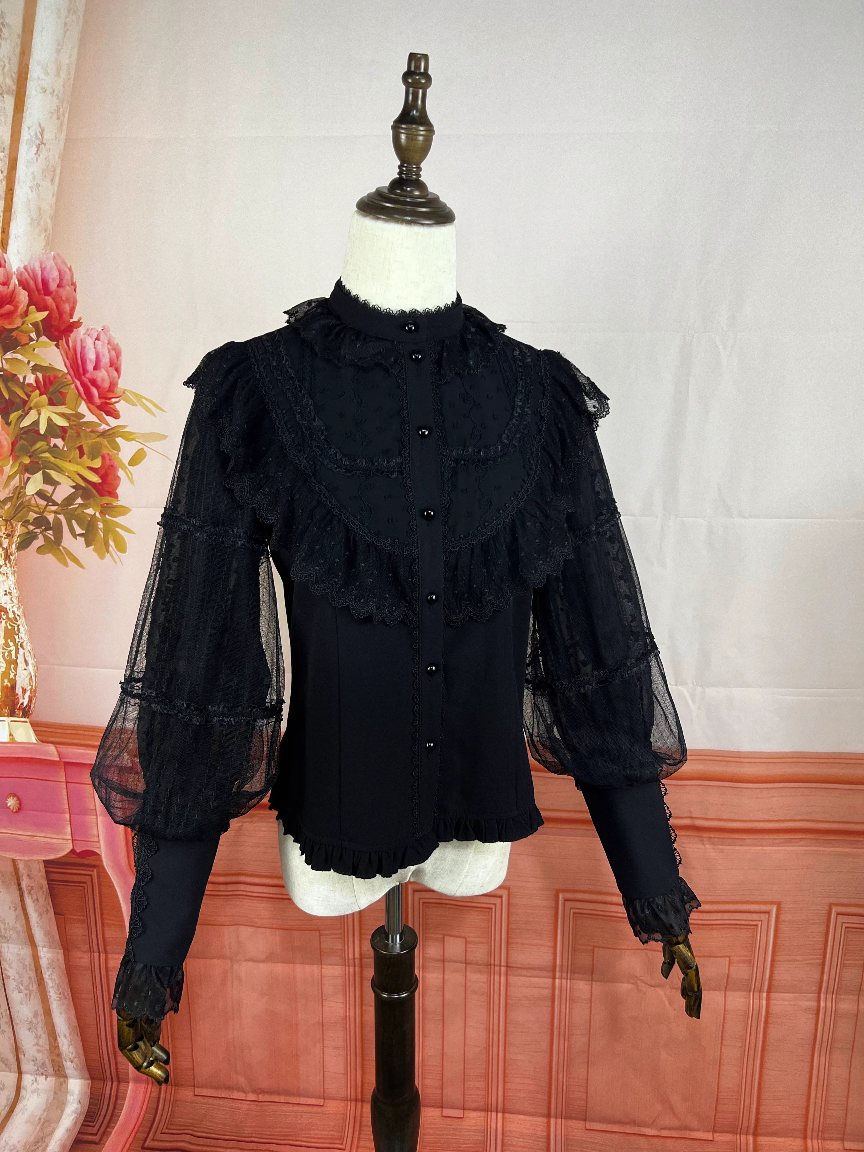 Design Concept:
This Lolita blouse features a refined stand collar and vintage CLA-inspired court style, combining elegance with classic Lolita charm. Available in Beige, Black, and White, it adds a sophisticated touch to any Lolita outfit. Perfect as a layering piece under jumpers or dresses, or worn on its own for daily wear and tea parties.